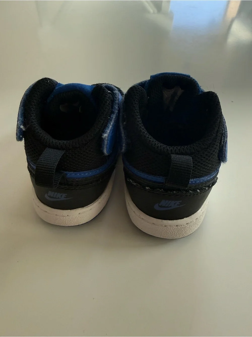 Nike Toddler Black and Blue High-Top Sneakers